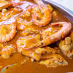 Pies de cerdo con gambas